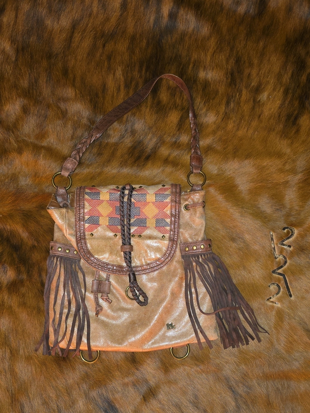 The Sak Brown Fringe Shoulder Bag with Woven Accent
